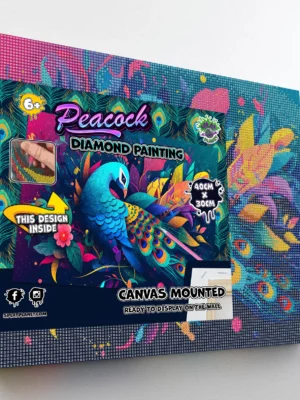 Framed peacock diamond painting craft kit from Tiny Explorers Hub ready for kids and adults to create colourful crystal artwork