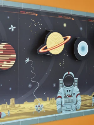 Children building and exploring a solar system wall chart and educational activity kit from Tiny Explorers Hub